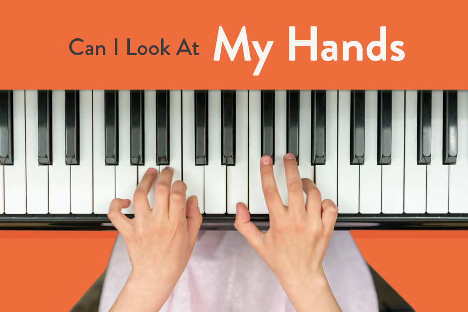 hands playing piano