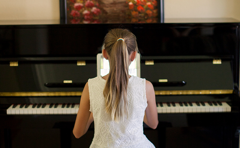 Girl Practicing Piano